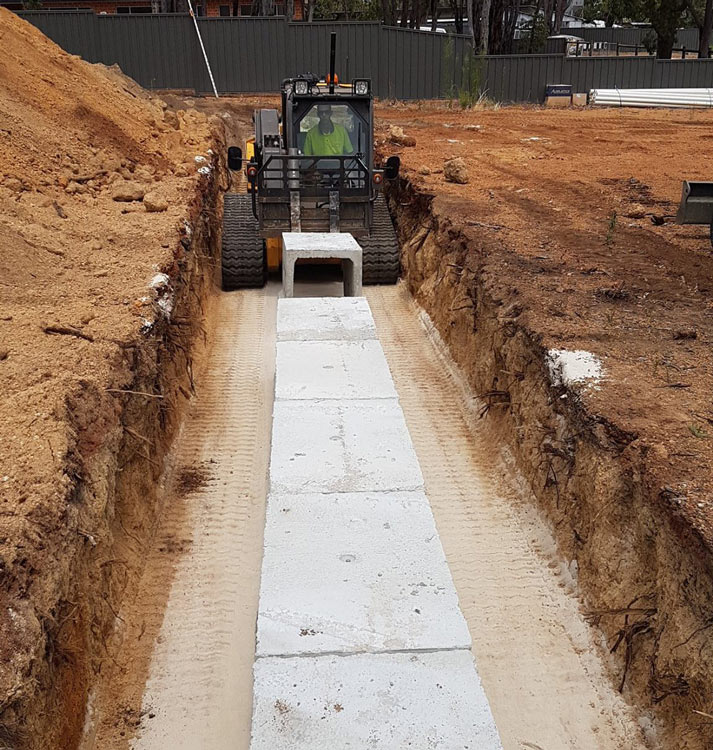 Installing pre-cast leach drains in Chidlow